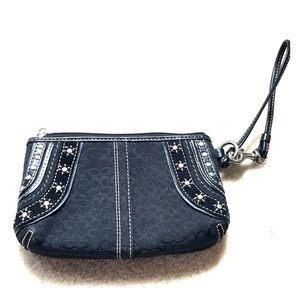 Small black canvas Coach clutch